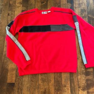 Obermeyer red and black and grey sweater. Youth XL.